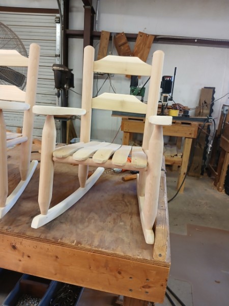 Baby sized unfinished wooden rocker